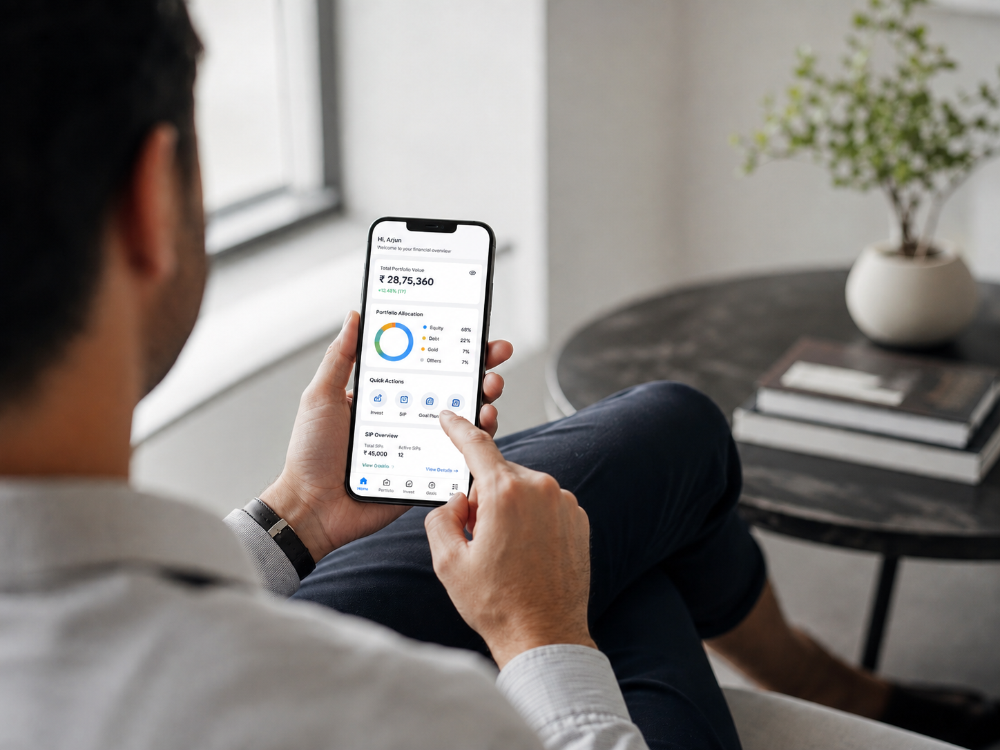 Person using the mobile wealth app on a smartphone